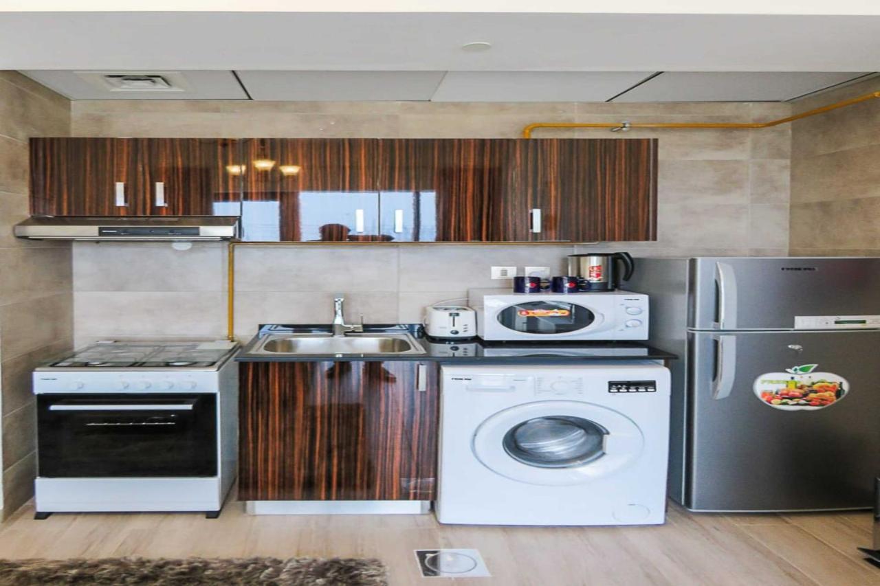 Oyo 860 Studio Apartment, Maya Tower 4, Jumeirah Village Triangle Dubai Dış mekan fotoğraf