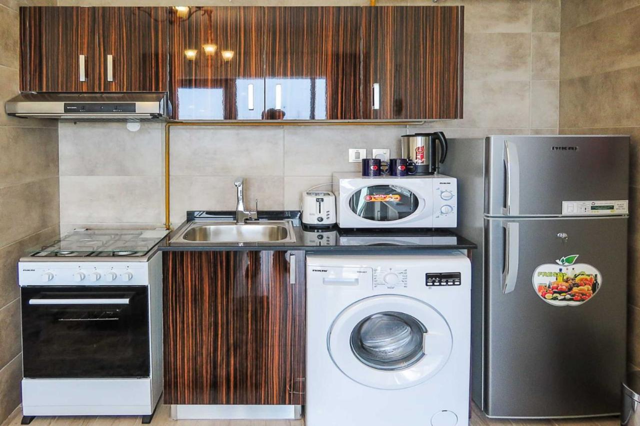 Oyo 860 Studio Apartment, Maya Tower 4, Jumeirah Village Triangle Dubai Dış mekan fotoğraf